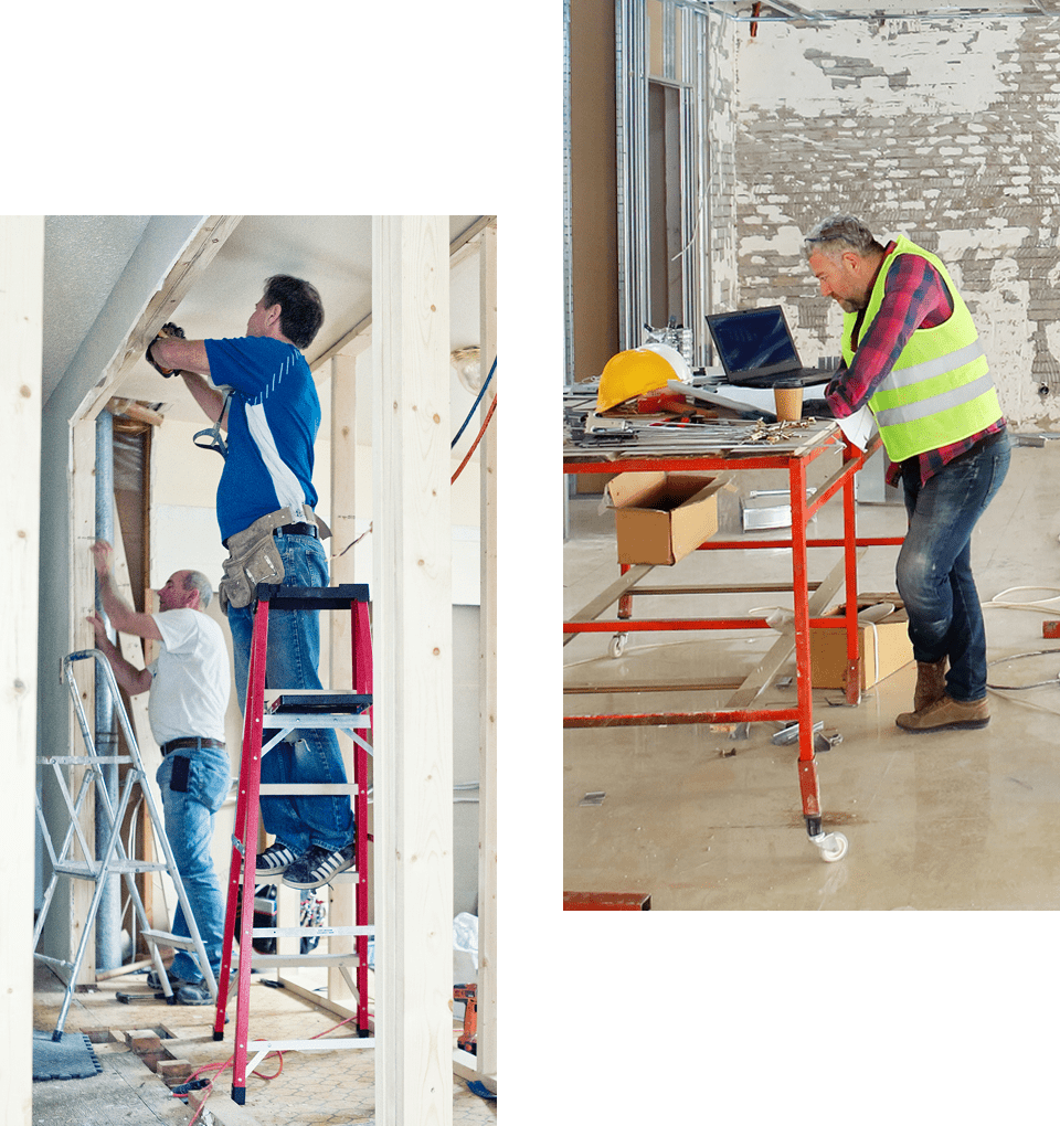 Workers on ladders in construction site